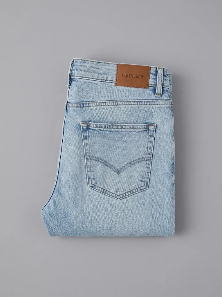 Pull & Bear vaqueros skinny rotos azul claro, doblados