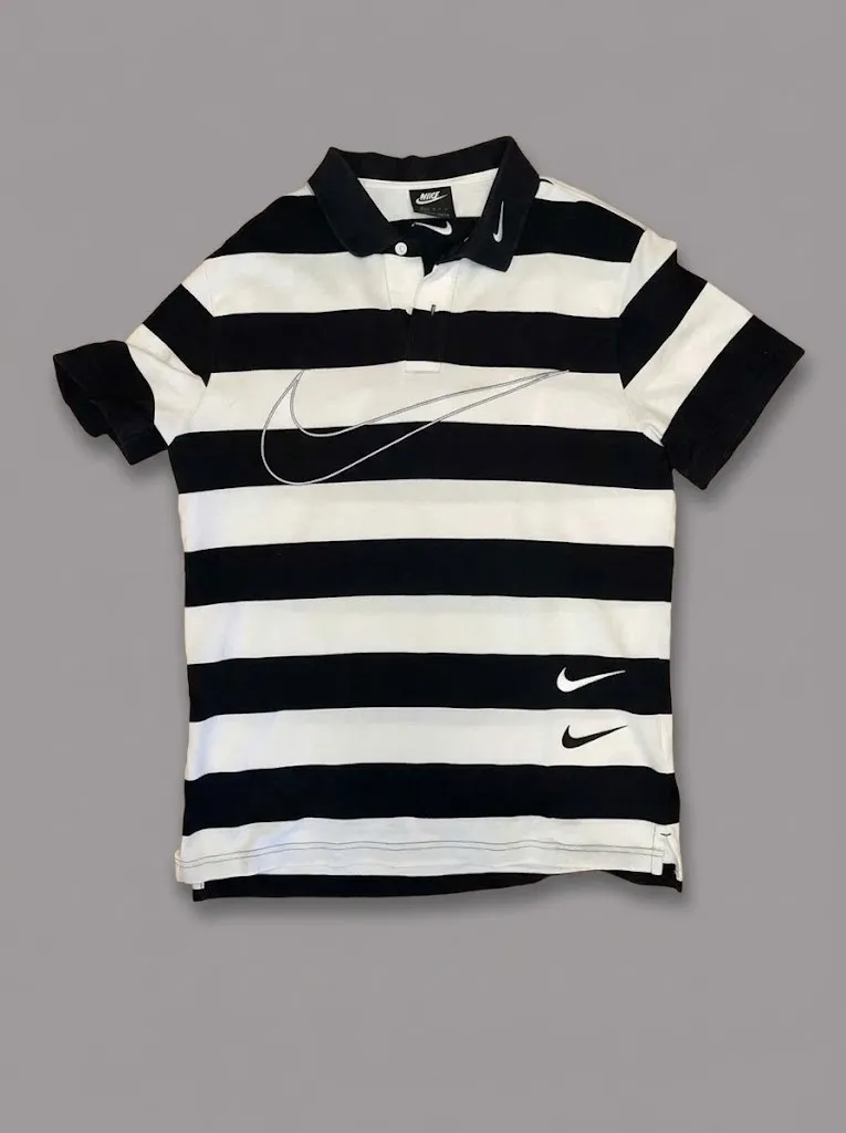 Nike polo rayas blanco y negro, vendido